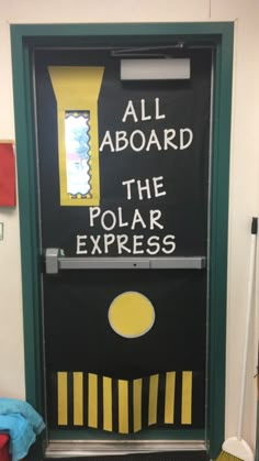 a door with the words all aboard, the polar express written on it