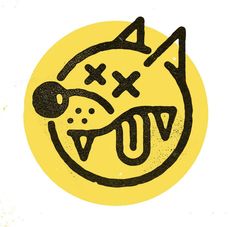 a black and yellow drawing of a cat's face in the center of a circle