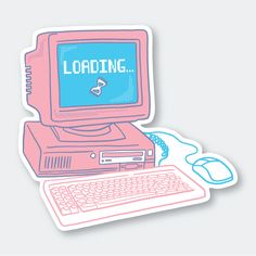 a sticker with an old computer and mouse on it that says loading next to the keyboard