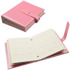 two notebooks with pink covers are next to each other