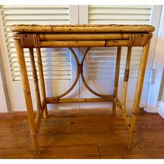 a small table made out of bamboo sticks