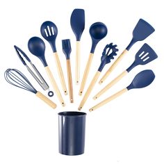 blue kitchen utensils and spatulas are arranged in a cup on a white background