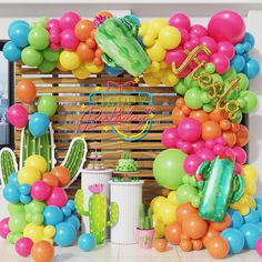 a bunch of balloons that are in front of a wall with a cactus on it