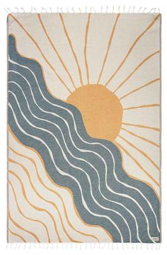 a rug with waves and the sun in the sky above it, on a white background