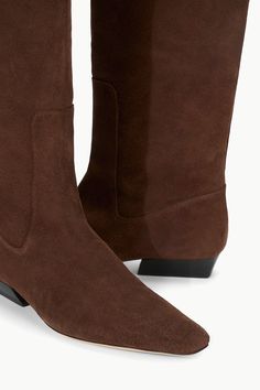 The newest addition to the Wally Family, this knee high boot features the classic Wally shape with an updated low stack heel for everyday wear. Staud Wally Boot Outfit, Staud Brown Bag For Everyday Use, Staud Brown Rectangular Bags, Staud Boots, Brown Tall Wide-calf Heeled Boots, Flat Boots, Stacked Heel, High Boots, Knee High Boots