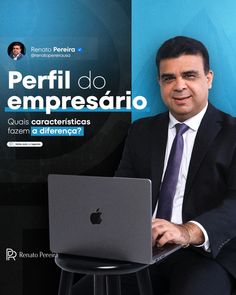 a man sitting in front of a laptop computer on top of a stool next to a blue wall