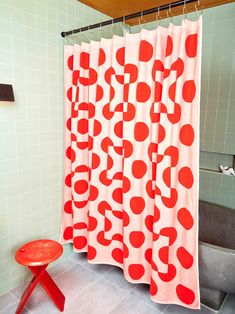 A red and salmon colored terry cloth shower curtain with circle and square shapes by Dusen Dusen hung in a sage green tile bathroom.  A red stool sits to the left of the curtain. Red Shower Curtains, Dusen Dusen, Dream Shower, Cool Shower Curtains, Unique Bathroom, Shower Liner, Kids Bath, Steel Furniture, Designer Shower Curtains