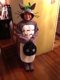 a child in a costume that looks like a cat