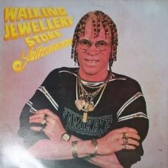 an album cover with a man wearing glasses and dreadlocks on his head, in front of a white background