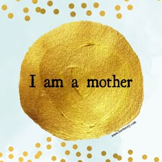 i am a mother written in black on a gold painted circle with polka dotes