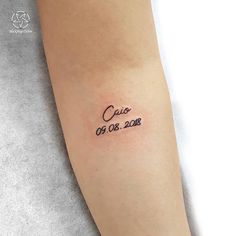 a woman's arm with a small tattoo on it that reads, cause 09 08 2018