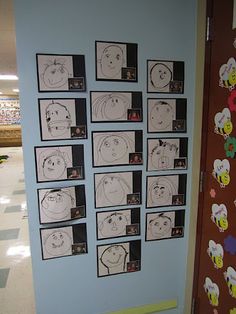 the wall is covered with pictures of children's faces and drawings on it,