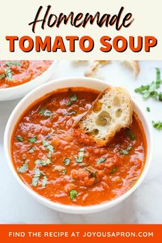 two bowls of homemade tomato soup with bread on the side and text overlay that reads homemade tomato soup