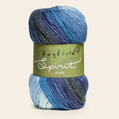 a skein of blue and white yarn with the words, hayfield spirit written on it