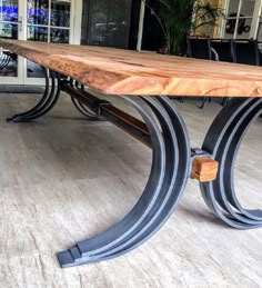 a table made out of metal and wood