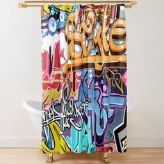 a shower curtain with colorful graffiti on it