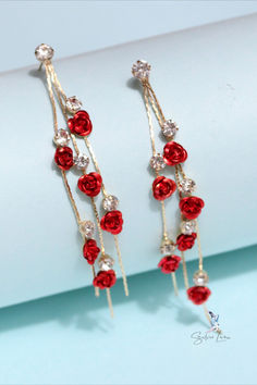 Red roses chain dangle drop earrings Party Flower Drop Earrings With Rose Design, Party Rose Design Drop Flower Earrings, Party Rose Design Flower Drop Earrings, Rose Flower Drop Earrings For Party, Rose Red Rose Design Earrings For Party, Rose Design Rose Red Earrings For Party, Rose Flower Earrings With Rose Design For Party, Rose Flower Drop Earrings For Valentine's Day, Rose Design Drop Earrings For Party