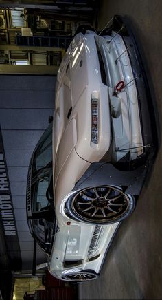 an overhead view of a car parked in a garage