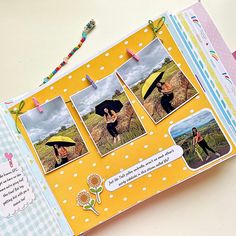 an open scrapbook with pictures of people holding umbrellas