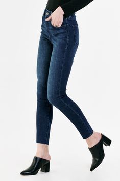 Super high rise ankle skinny jeans. It's the flirty fit that sits at the natural waist and fitted skinny in the hips through the leg. Ankle inseam on comfort stretch denim accented with back "X" belt loop, handsanding hip whiskers, tonal navy stitching, cut-off hem details.10 1/2" Front Rise (include waistband), 10" Leg Opening, 28" inseam (Size 27) 92% COTTON 6% RECYCLED POLYESTER 2% SPANDEX Machine wash cold, Tumble dry low Imported Zip fly and button closure Five-pocket style Dark Wash High Rise Jeans With Frayed Hem, Fall Mid-rise Jeans With Frayed Hem, Dark Wash Stretch Cropped Jeans With Frayed Hem, Dark Wash Slim Fit Bottoms For Fall, Stretch Cropped Jeans With Frayed Hem In Dark Wash, Mid-rise Denim Jeggings With Frayed Hem, High Rise Medium Wash Jeggings For Fall, High Rise Dark Wash Pants With Frayed Hem, Stretch Jeans With Frayed Hem In Dark Wash