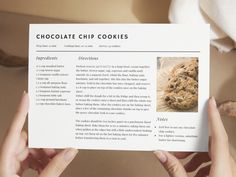 someone holding up a recipe book with chocolate chip cookies