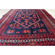 Elevate your space with the timeless allure of this Handmade Vintage Caucasian Karabagh Rug. Dating back to the 1940s, this exquisite woolen piece measures 3.9' x 5.8' (120cm x 179cm) and is in original, good condition.  Hailing from Armenia, this rug boasts the distinctive Karabagh style, celebrated for its intricate large medallion design. The background is adorned with a harmonious interplay of navy blue, bright red, and beige, creating a vibrant and captivating visual.  This vintage rug is a Red And Beige, Medallion Design, Armenia, Bright Red, Vintage Rug, Vintage Rugs, Navy Blue, Rug, Navy