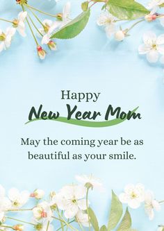 a happy new year card with white flowers and green leaves on a blue background that says, may the coming year be as beautiful as your smile