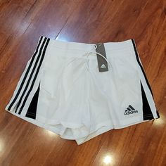 Nwt Adidas Shorts. They Have 2 Front Pockets. Material Had The Parachute/Swishy Feel. White Adidas Sports Shorts, Adidas Sporty White Athletic Shorts, Adidas White Athletic Shorts With Built-in Shorts, Adidas White Sports Shorts, Adidas White Casual Shorts, Adidas Casual White Shorts, Adidas White Sporty Shorts, Adidas White Bottoms With Built-in Shorts, Adidas White Summer Bottoms