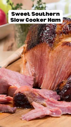 a large piece of meat sitting on top of a wooden cutting board