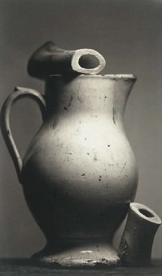 black and white photograph of an old pitcher