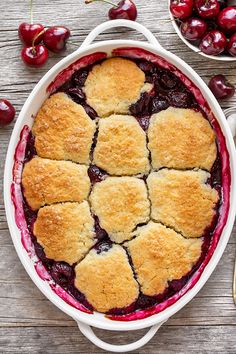 cherry cobbler with fresh cherries on the side