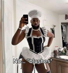 a woman in a maid outfit taking a selfie