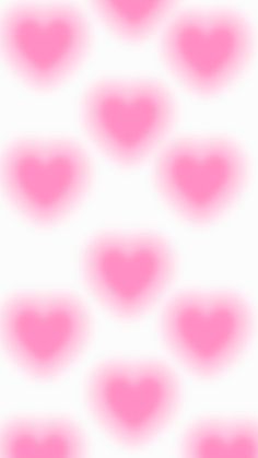 a pink and white background with hearts on it