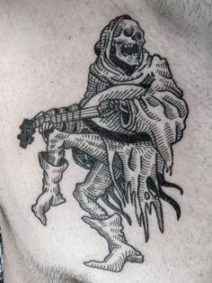 a man's chest with a skeleton tattoo on it and a knife in his hand