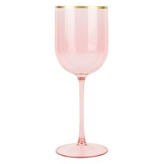 a pink wine glass with gold rim