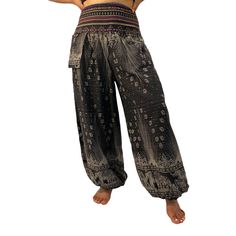 "Handmade Material: Organic Cotton Waist: Approx. 21\" to 42\" Hips: Approx. up to 27\" to 54\" Length: Approx. 39\" Material : 100% cotton Unisexual This Cotton Pant with Hand Embroidery has the adjustable waist with elastic and fits most sizes and is perfect for practising yoga , dancing and can be dressed up. WE GLADLY ACCEPT FREE RETURNS!!" Bohemian Style Relaxed Fit Bottoms, Hippie Style Relaxed Fit Bottoms For Festival, Black Hippie Long Pants, Bohemian Black Pants, Hippie Harem Yoga Pants, Bohemian Festival Bottoms With Elastic Waistband, Hippie Ankle-length Pants With Elastic Waistband, Non-stretch Bohemian Bottoms For Yoga, Hippie Full-length Pants For Festival