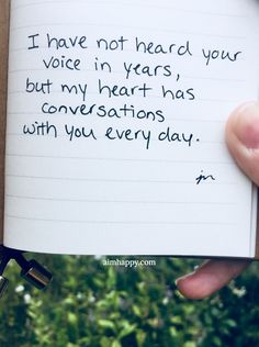 someone is holding up a note that says i have not heard your voice in years, but my heart has conversations with you every day