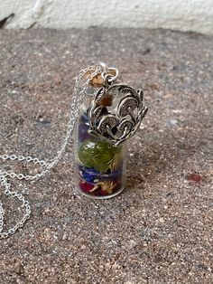 Want to attract the Fae and surround yourself with their power? Look no further than our faery magick spell jar necklaces - a miniature way to build a bridge between the Faerie Realm and our own. Our faerie magick necklaces are a uniquely portable magick created to help you stay in tune with the faeries' frequencies no matter where you are, with the help of juniper berries, peridot, fluorite, amethyst, rose, jasmine, and cornflower. Each faery magick necklace is handcrafted by our resident Fae W Spiritual Nickel-free Necklaces, Witch Gift, Magick Spells, Witch Jewelry, The Help, Necklace Etsy, Gemstone Rings, Amethyst, Charm Bracelet