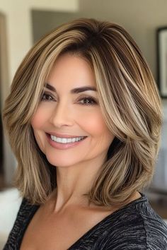 Save this pin for the best layered bob hairstyles for women over 50. The layered long bob gives you enough length to play around with, but with the added texture that keeps it from feeling too heavy. The layers help your hair flow, giving you that easy, breezy feel. Long Bob With Layers And Curtain Bangs, Long Inverted Bob With Layers, Layered Long Bob, Feathered Bob, Layered Bob With Bangs, Layered Bobs, Blonde Layers, Chin Length Bob