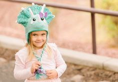 "Looking for an awesome dinosaur hat? Look no further! This is the perfect triceratops hat. This hat is so fun and there is lots you can do with it. Make the triceratops hat it into a Halloween costume, birthday party hat, pretend play hat, or just use it for fun to keep you warm. Choose your favorite triceratops color and make it unique. All dinosaur lovers will love this. With these detailed instructions, even those with little crochet experience can find success creating their own masterpiece Crochet Santa Hat Pattern, Dinosaur Beanie, Crochet Triceratops, Crochet Unicorn Blanket, Santa Hat Pattern, Crochet Santa Hat, Dinosaur Crochet, Dragon Hats, Dinosaur Hat