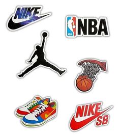 several different stickers that are on the side of a white wall and one has a basketball