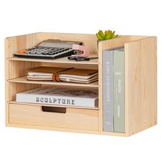 a book shelf with books and a calculator on it's side, in front of a white background