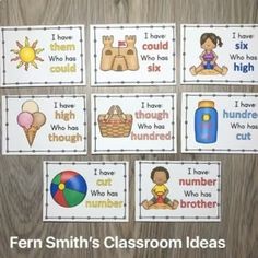 four classroom cards with pictures of children's names and numbers, including one for each child