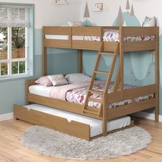 a child's bedroom with a bunk bed and trundle bed in it