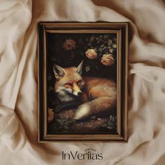 an oil painting of a fox resting on the ground with roses in it's frame