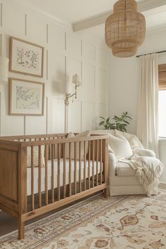 a baby's room with a crib, chair and rug