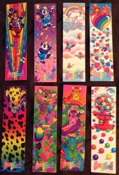 six colorful bookmarks with cartoon characters and rainbows on the covers, all lined up in rows