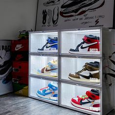 a display case filled with different types of shoes