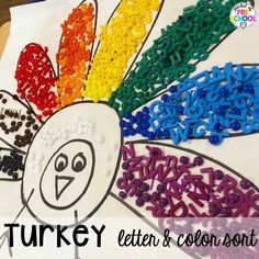 a turkey made out of letters and beads with the words turkey written in front of it