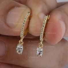 Genuine Solitaire Oval Cut Diamond Drop Huggie Hoop Earrings In Solid 14K Yellow Gold Pave Diamond Wedding Earrings Handmade Jewelry * SKU: SE01468 * Made to Order * Gold Purity: 14K Solid Yellow/ Rose/ White Gold (stamped) * Custom Gold Color: Rose Gold, Yellow Gold, White Gold * Custom Gold Purity: 9K/14K/18K (Charges Apply) * Diamond 100% Genuine Diamond * Small Diamond wt: 0.18 Ct. (Round) * Oval Diamond wt: 0.50 Ct. (0.25 ct Each Diamond) * Diamond Color: G-H * Diamond Clarity: SI1- SI2 * D Elegant Bridal Jewelry, Special Gift Ideas, Diamond Earrings Wedding, Small Drop Earrings, Diamond Ear Cuff, Pave Diamond Earrings, Solid Gold Earrings, Diamond Charm, Oval Cut Diamond